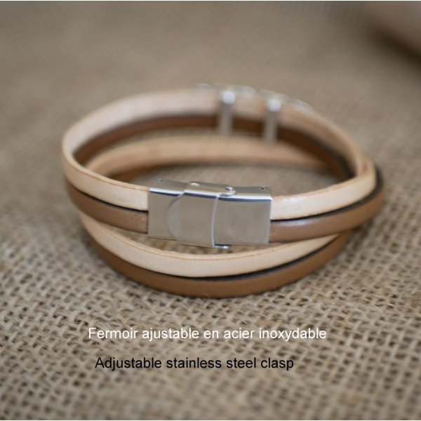 Dubbele lederen band in duo versierd met een zilveren veer