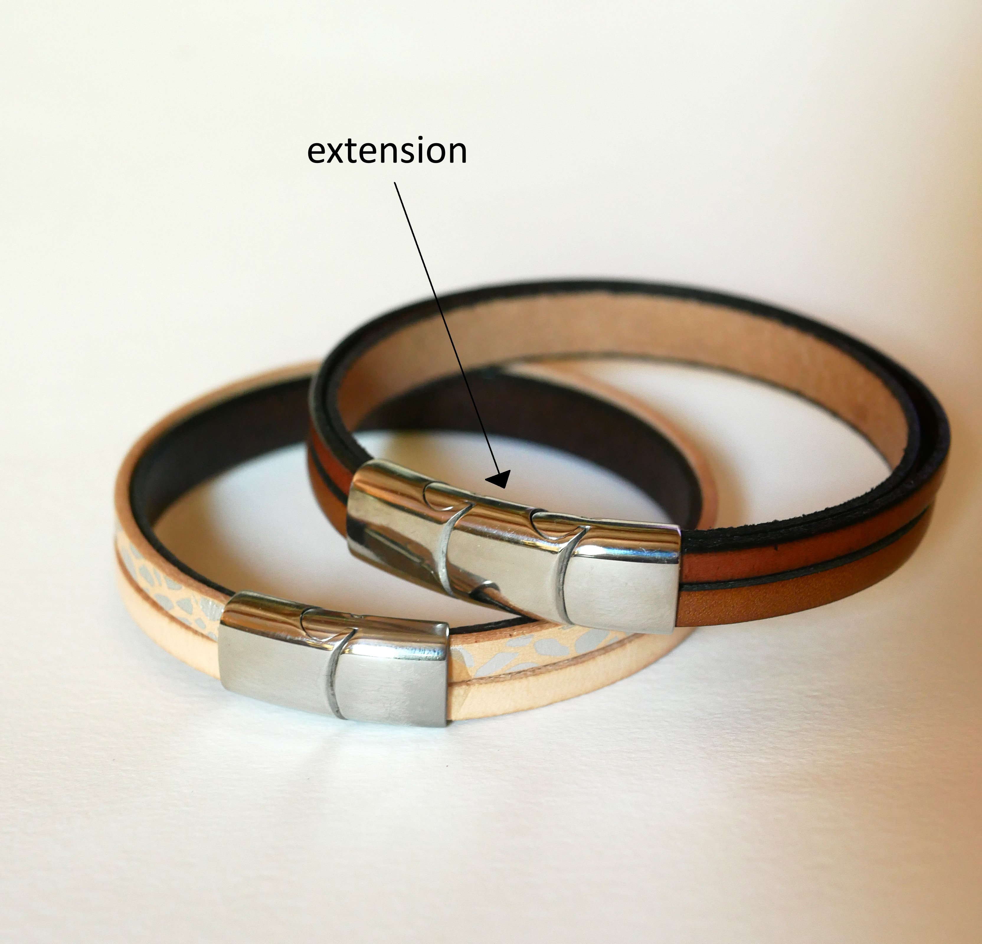 Bruine leren armband met gevlochten metalen voering en magnetische sluiting