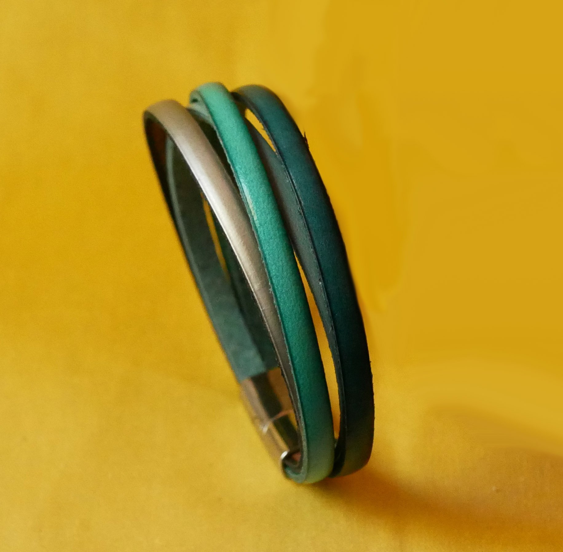 Manchetarmband met 4 turquoise ledersoorten