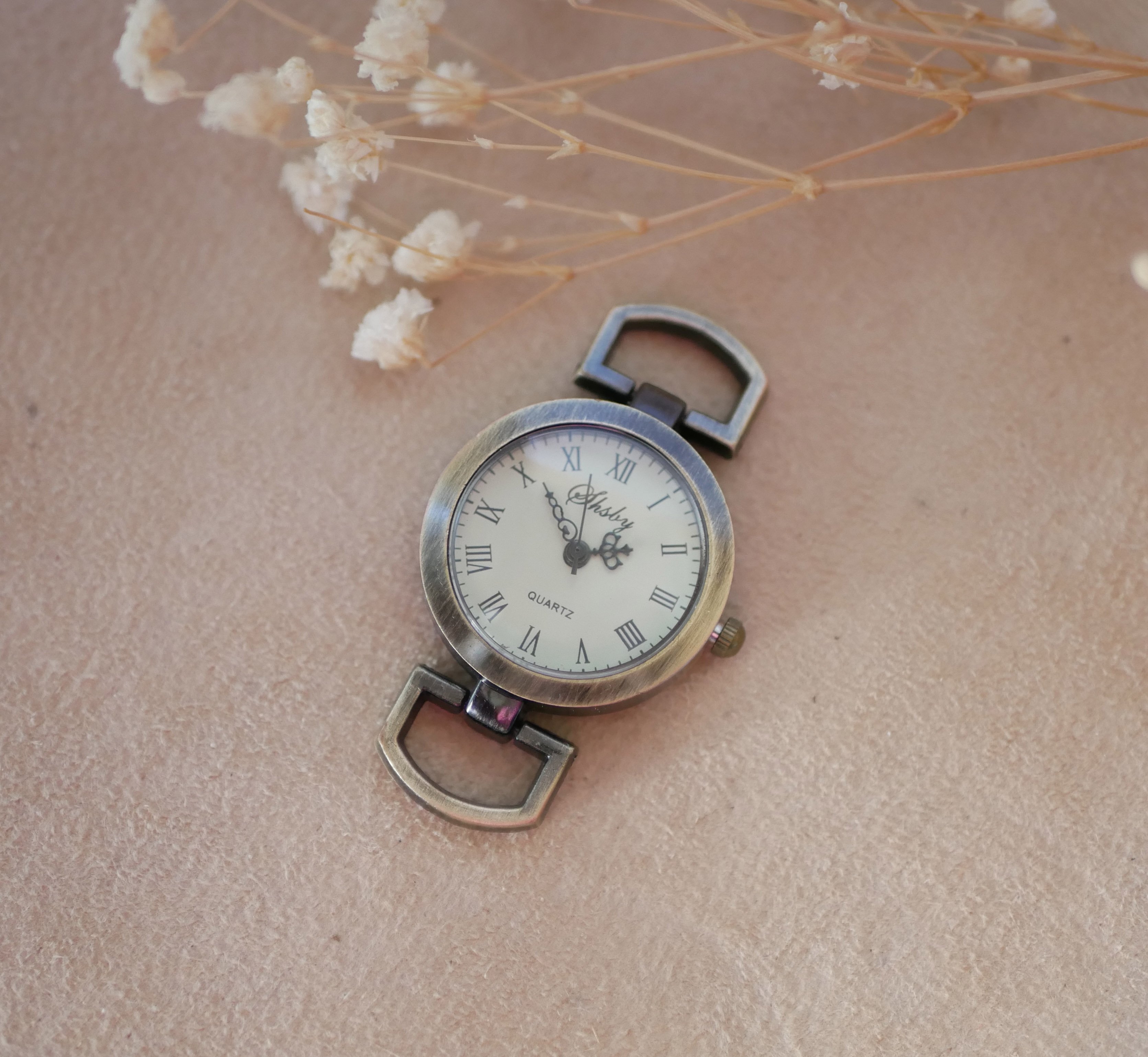 Wijzerplaat bronzen horloge Romeinse cijfers