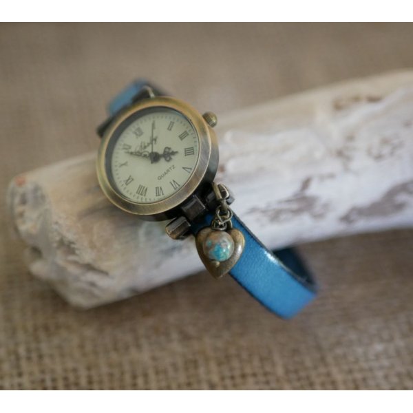 Horloge met bronzen wijzerplaat en aanpasbare lederen band