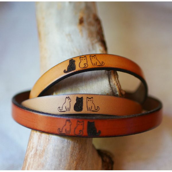 Trio lederen armbanden gepersonaliseerd door gravure met ontwerpen van uw keuze