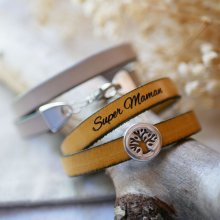 Gepersonaliseerde lederen armband versierd met een levensboom cabochon