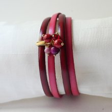Duo lederen armband versierd met fuchsia parels