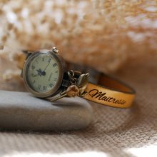 Horloge met bronzen wijzerplaat en aanpasbare lederen band